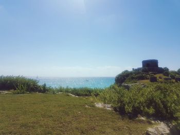 Scenic view of sea against clear blue sky