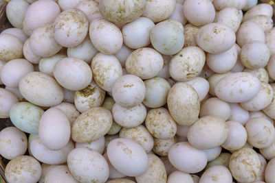 Full frame shot of onions for sale at market