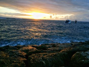 Scenic view of sea against sky during sunset