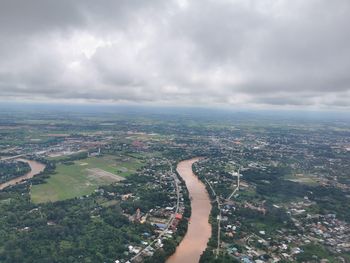 High angle view of city buildings against sky