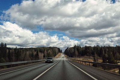 Car on country road against sky