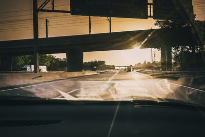 Road seen through car windshield