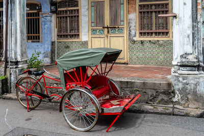 Bicycle parked outside building