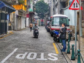 People on street in city