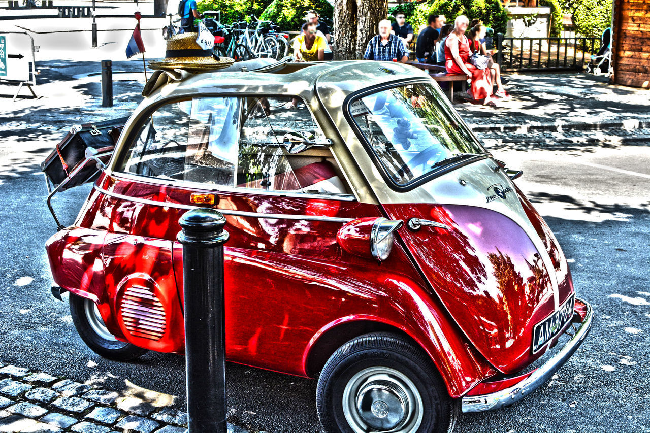 RED CAR ON ROAD