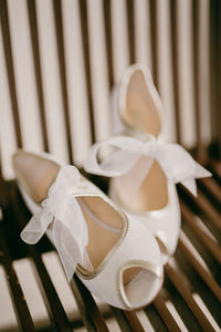 Close-up of white shoes tied up