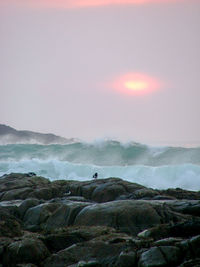 Scenic view of sea at sunset