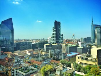 Skyscrapers against blue sky
