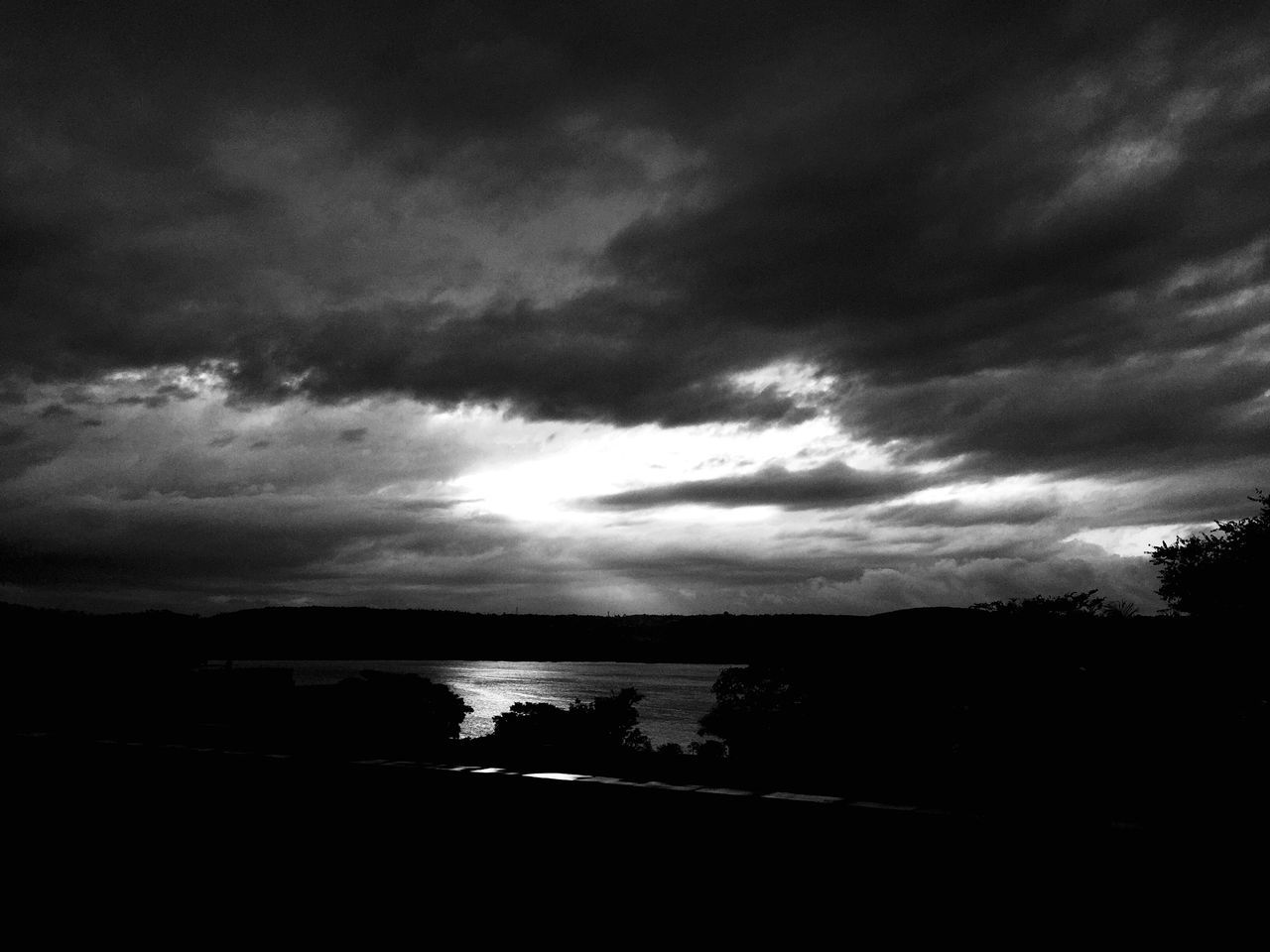 sky, cloud - sky, tranquil scene, tranquility, water, scenics, silhouette, cloudy, beauty in nature, tree, nature, cloud, weather, overcast, lake, idyllic, dusk, sunset, outdoors, river