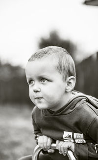 Close-up of boy looking away