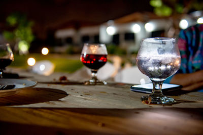 Close-up of wine glass on table