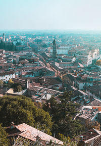 Blue hours in verona city centre, italy. panoramic view from above on streets and adige river