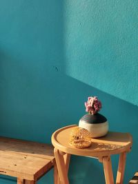 High angle view of potted plant on table against wall