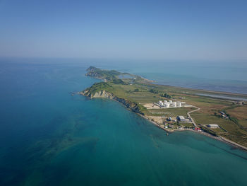 Scenic view of sea against blue sky