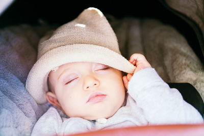 Cute baby sleeping on bed