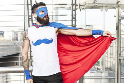 Young hipster superhero fights evil