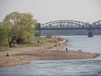 Bridge over river against clear sky