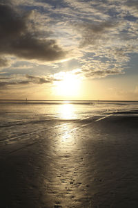 Scenic view of sea at sunset