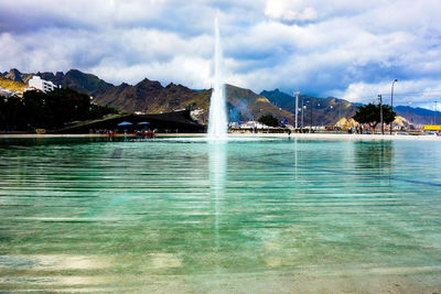 Scenic view of sea against cloudy sky
