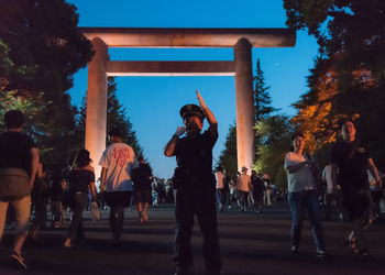 People enjoying music concert at night