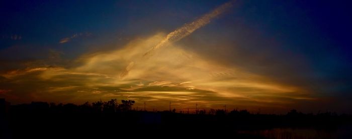 Scenic view of dramatic sky during sunset