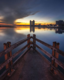 Scenic view of lake against sky during sunset