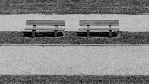 High angle view of empty bench in park