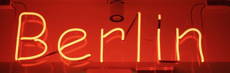 Close-up of illuminated berlin neon sign