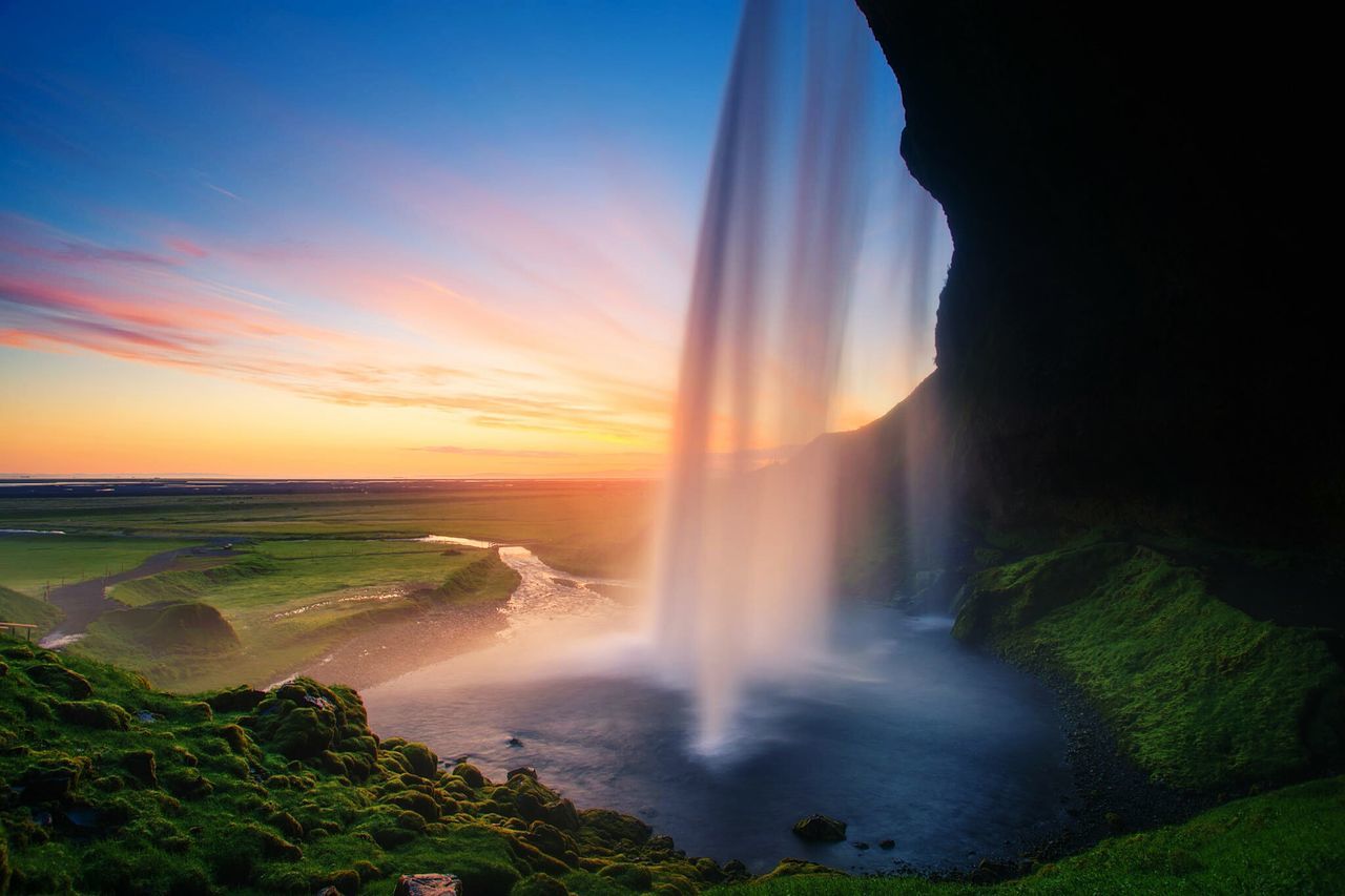 water, scenics, beauty in nature, tranquil scene, nature, sea, motion, sky, long exposure, tranquility, horizon over water, idyllic, sunset, sunbeam, rock - object, sunlight, waterfall, rock formation, sun, surf