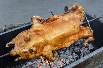 Close-up of meat on barbecue grill