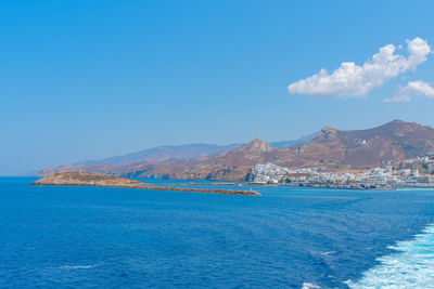 Scenic view of sea against blue sky