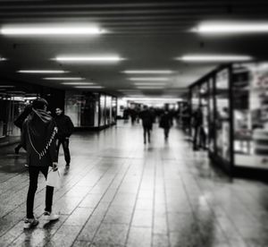 People walking in subway station