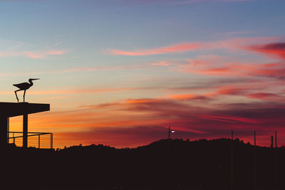 Low angle view of silhouette scenic sky
