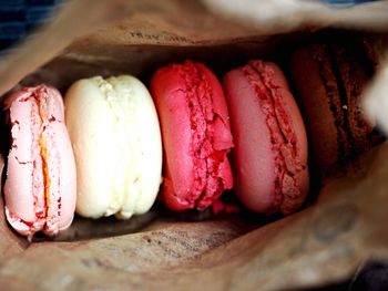 Close-up of french macaroons in paper bag