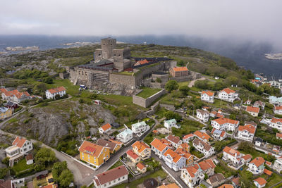 Sweden, vastra gotaland county, marstrand, aerial view of carlsten fortress and surrounding houses