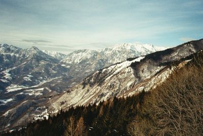 Scenic view of snowcapped mountains against sky