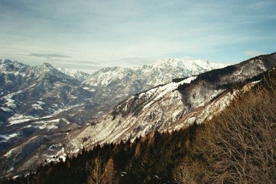 Scenic view of snowcapped mountains against sky