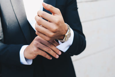 Close-up of couple holding hands