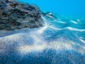 Surface level of rocky beach