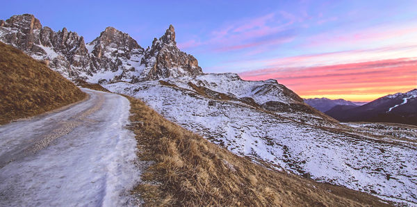 Scenic view of snow covered mountain against sky