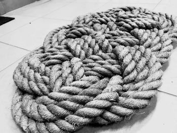 Close-up of rope tied to bollard