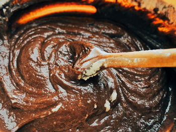 Close-up of wooden spoon in chocolate