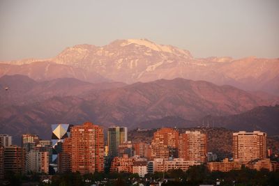 View of city against mountain range