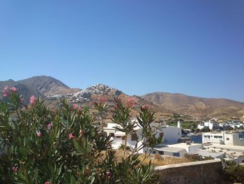 View of mountain range against clear blue sky