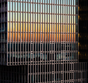 Full frame shot of metal fence against building