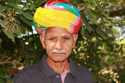 Portrait of man wearing sunglasses outdoors