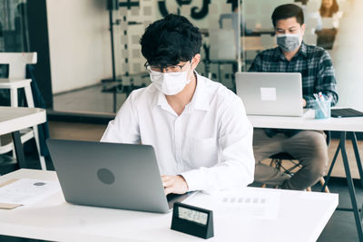 Man working on table