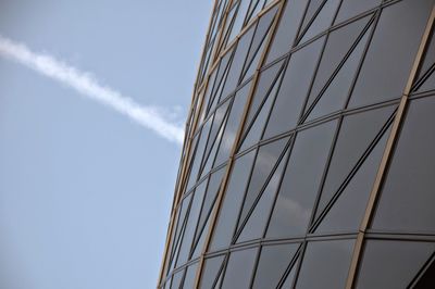 Low angle view of vapor trail against clear sky