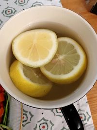 High angle view of fruits in plate on table