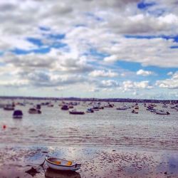 Scenic view of sea against cloudy sky